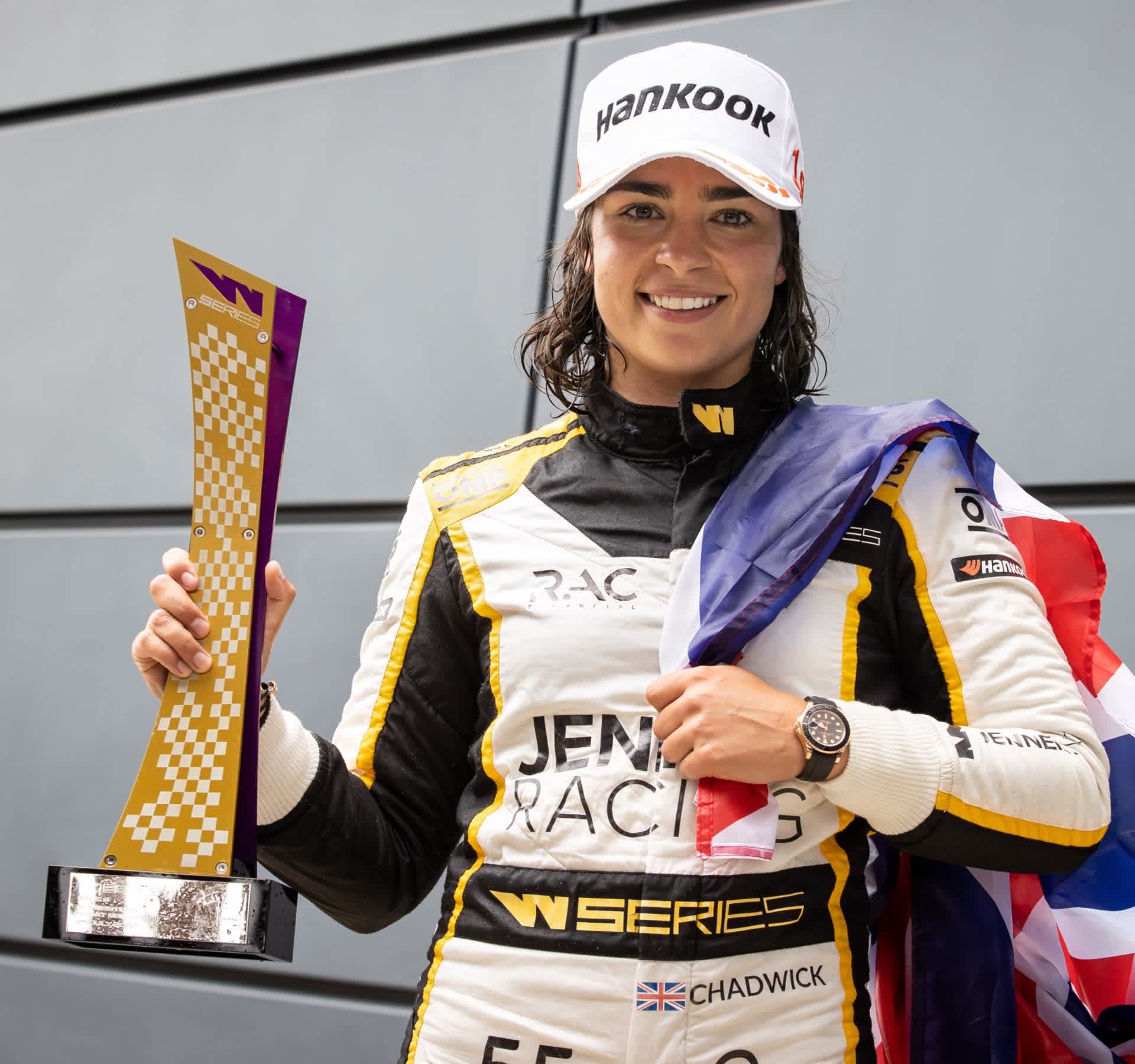 Jamie Chadwick after winning the W Series, wearing a Rolex Cosmograph Daytona