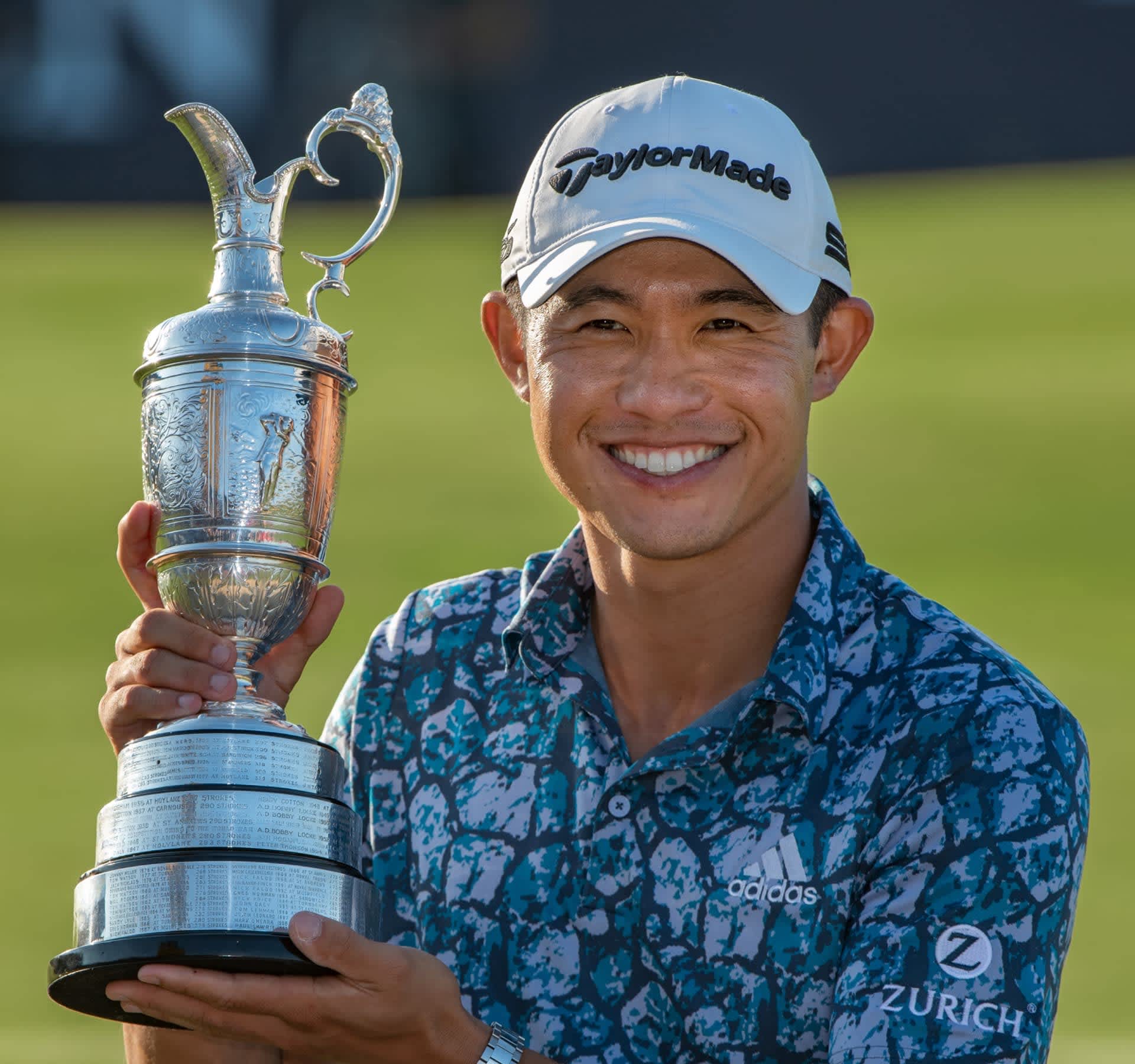 Collin Morikawa with the trophy