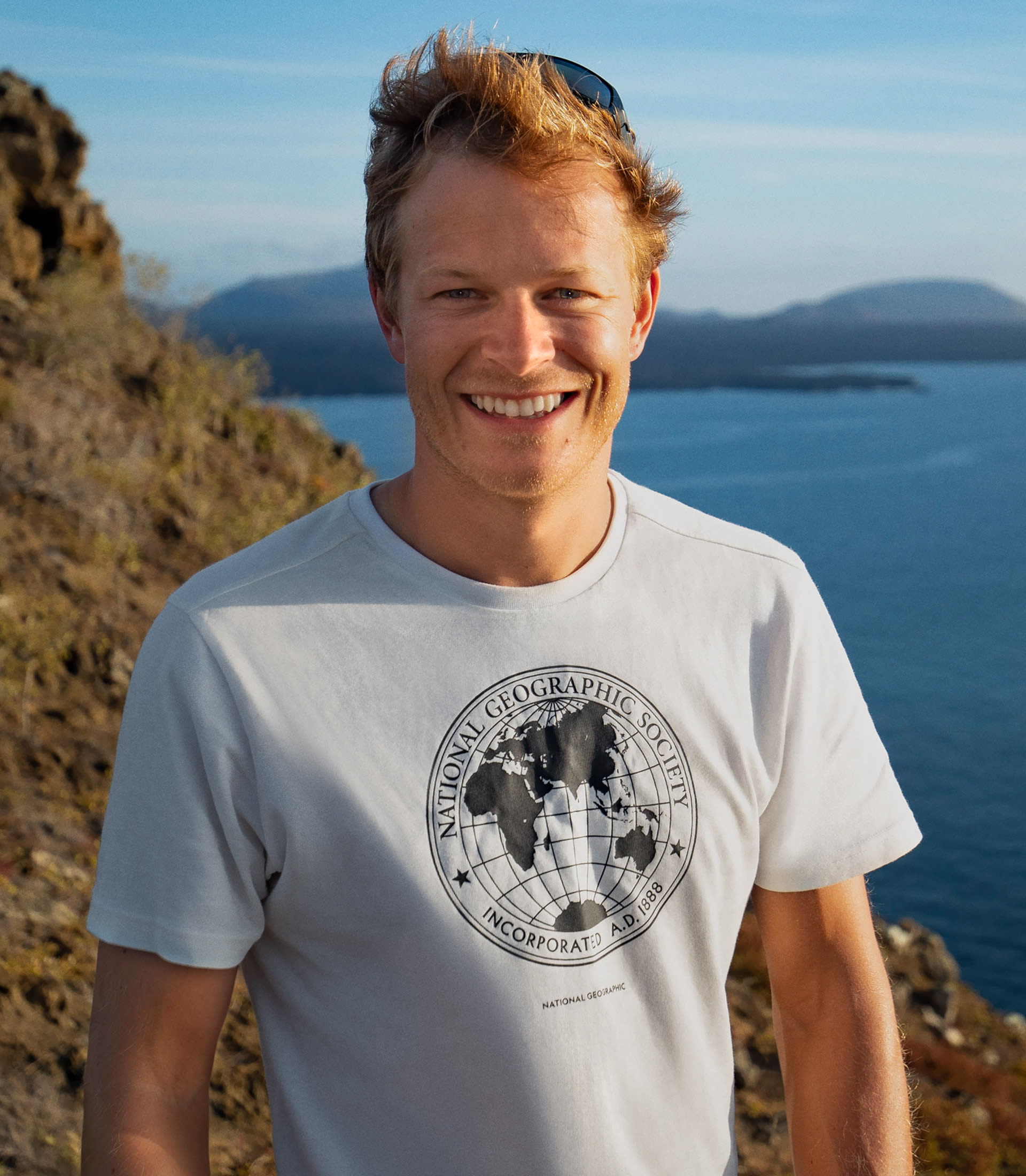 Bertie Gregory in a white t-shirt portrait