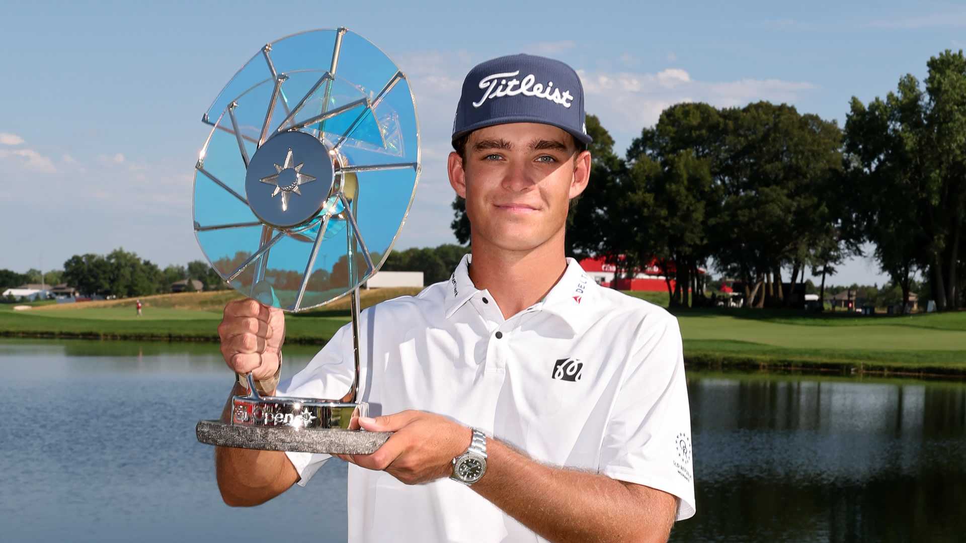 Jackson Koivun holding the trophy